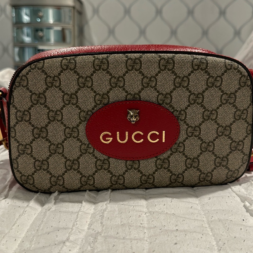 Gucci Animalier Camera Messenger
Bag GG Coated Canvas